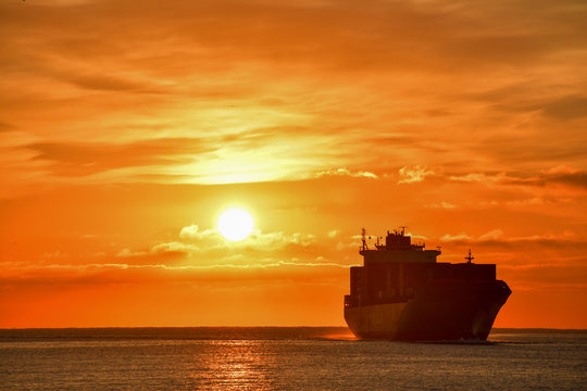 Container Ship at sunset 